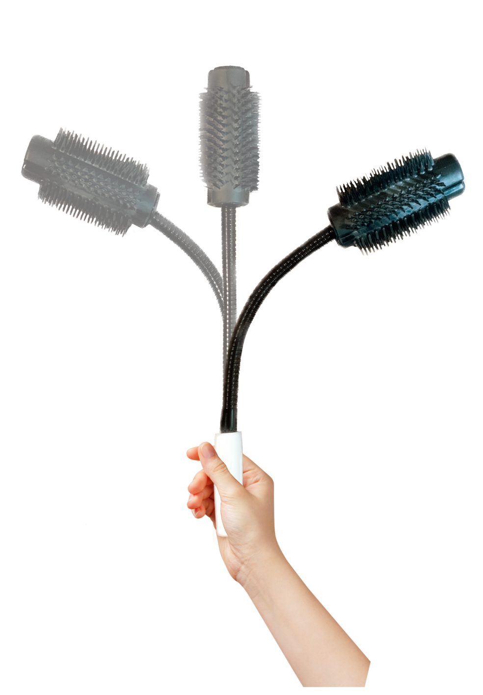 [Alt-text]: right hand holding adaptive hairbrush bending to left, center, and right positions.